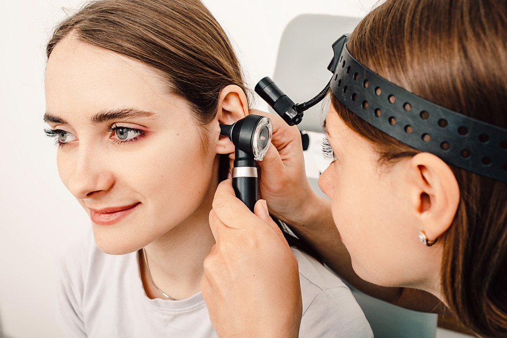 Ear examination with an otoscope