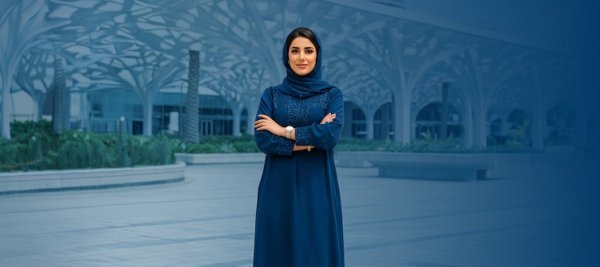 woman standing with arms wrapped